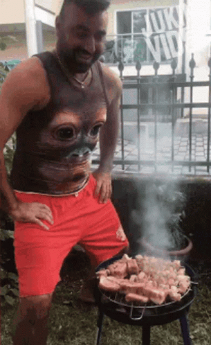 Meat Cooking on Grill with Sauce