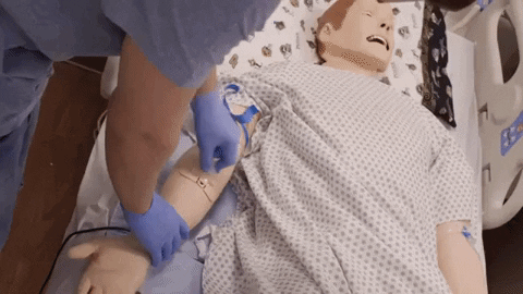 Medical Student Practicing Injection GIF