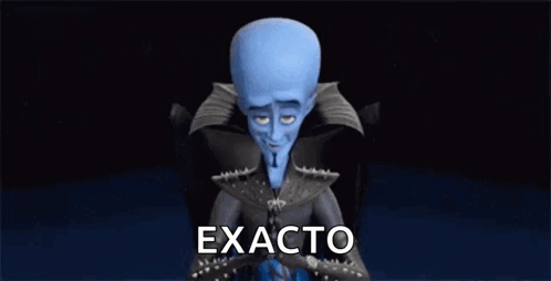 Megamind Cartoon Character Sitting with Folded Hands