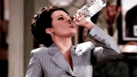 Megan Mullally On Two Shots Of Vodka GIF