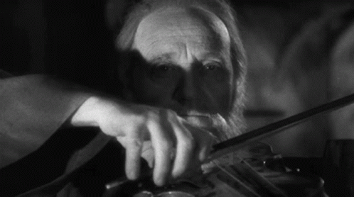 Melancholic Man Worlds Smallest Violin GIF