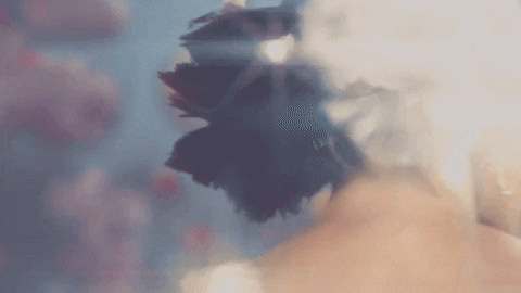 Melanie Martinez Elastic Face GIF