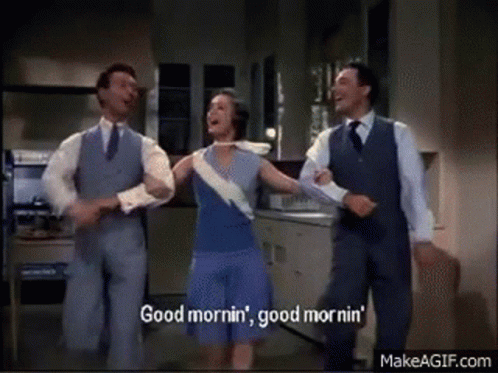 Men and Woman Dancing in Kitchen Saying Good Morning