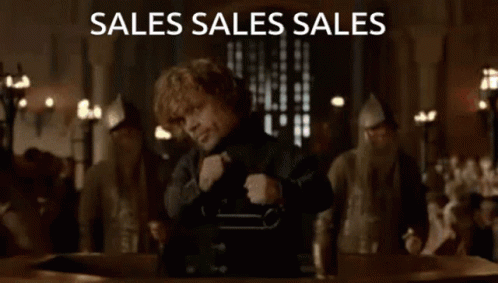 Men Around Table Saying Sales Sales Sales GIF