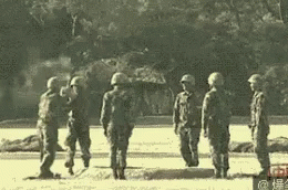 Men Cadet Plays With Bomb GIF