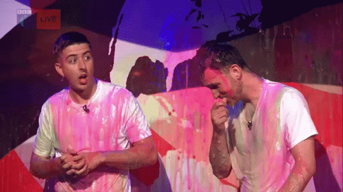 Men Covered In Pink Paint GIF