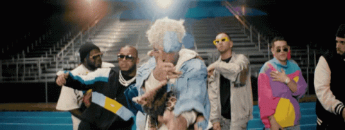 Men Dancing at Bleachers in Colorful Jackets