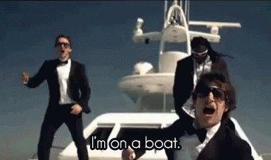 Men Dancing By Boat Saying I'm On A Boat GIF