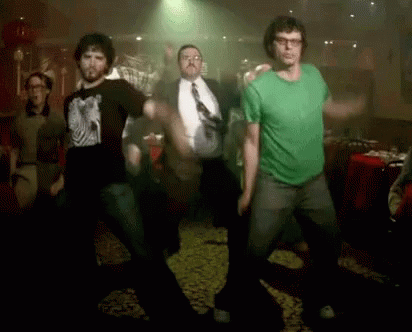 Men Dancing Dark Room, One In Green Shirt GIF