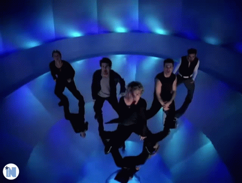 Men Dancing In Blue Room With N GIF