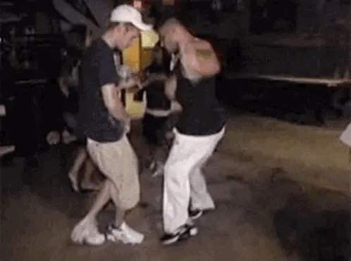Men Dancing in Club