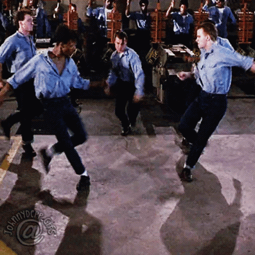 Men Dancing In Front Of Johnny Depp Sign GIF