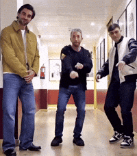 Men Dancing in Hallway
