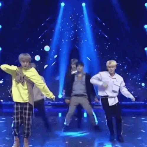 Men Dancing on Blue Background Stage