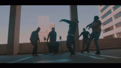 Men Dancing on Rooftop