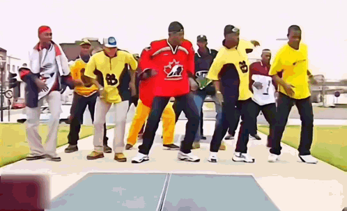 Men Dancing One Wearing Red Jersey Number 8 GIF