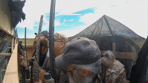 Men Duck Hunting With Decoys GIF