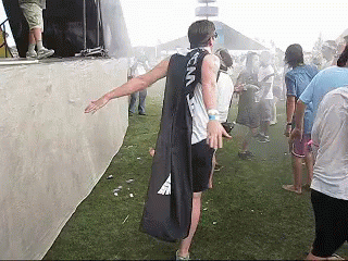 Men Enjoys Spraying Water At Coachella GIF