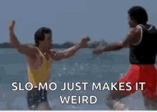 Men Fighting in Water Slo-Mo Weird
