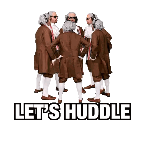 Men Huddling in Circle