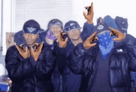 Men In Blue Jackets And Bandanas GIF