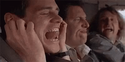 Men In Car Laughing Covering Ears GIF
