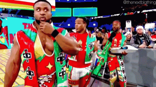 Men In Christmas Outfits In Wrestling Ring GIF