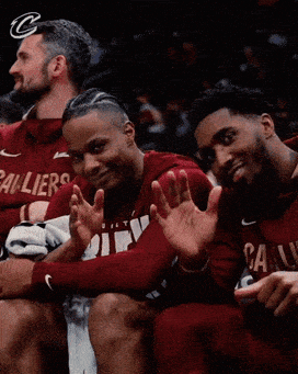 Men In Cleveland Cavaliers Jerseys Sitting GIF