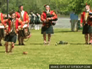 Men in Kilts Playing Bagpipes and Drums