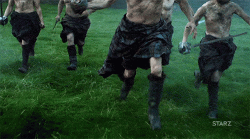 Men In Kilts Running In Field With Starz GIF