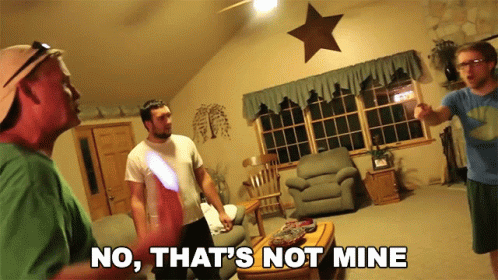 Men in Living Room Saying No That's Not Mine