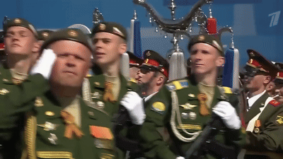 Men in Military Uniforms Marching