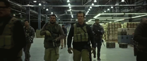 Men in Military Uniforms Walking