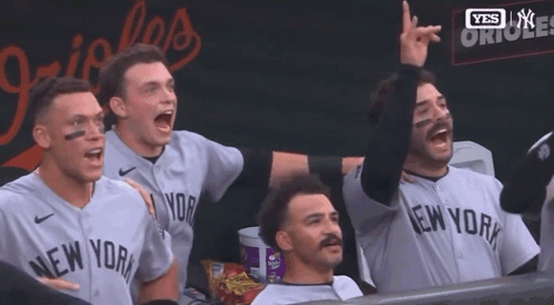 Men In New York Jerseys Sitting In Dugout GIF