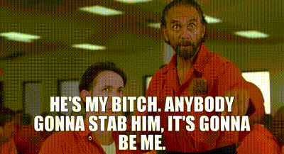 Men In Orange Jumpsuits Talking GIF
