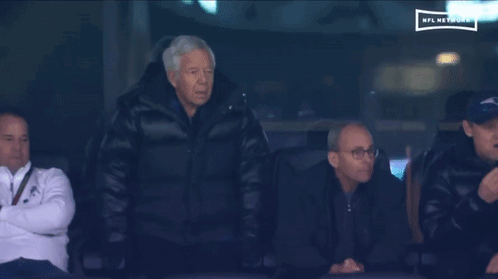 Men in Stadium Watching NFL Network