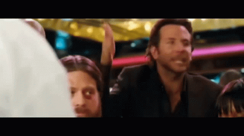 Men in Suit High Fiving