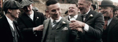 Men In Suits And Hats Laughing GIF