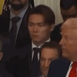 Men in Suits and Ties Standing Together
