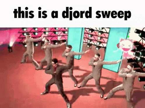 Men in Suits Dancing on Stage