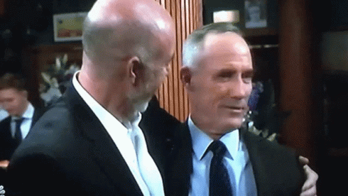 Men In Suits Hugging GIF