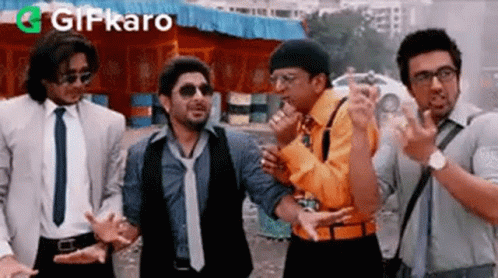 Men In Suits Making Funny Faces GIF