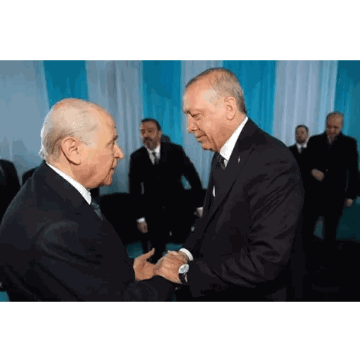 Men in Suits Shaking Hands