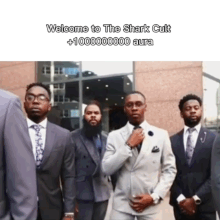 Men in Suits Standing in Front of Shark Cult