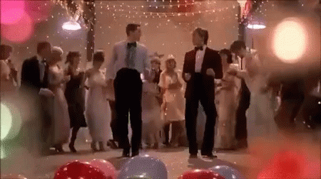 Men in Tuxedos Dancing