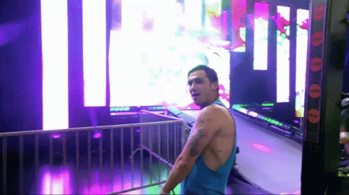 Men In Wrestling Ring With Impact Sign GIF