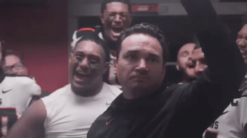 Men Laughing in Locker Room