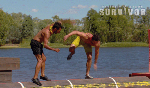 Men Lose Balance On Spinning Platform GIF