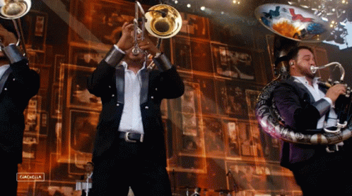 Men Playing Brass Instruments with Cancela Sign