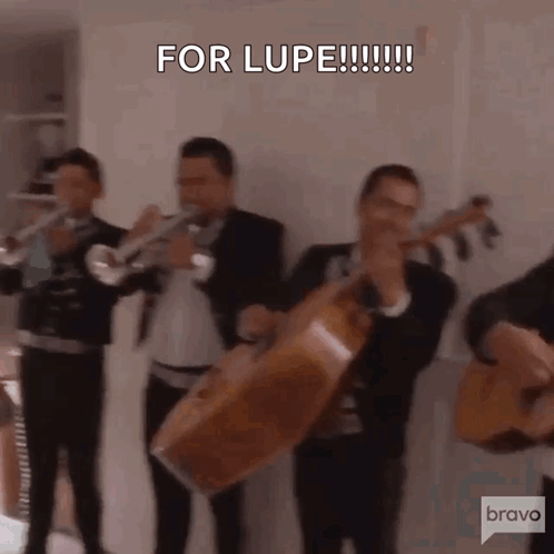 Men Playing Instruments With Lupe